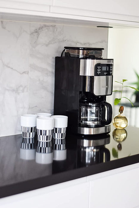 SEVERIN Filterkaffeemaschine mit Edelstahl-Mahlwerk, feinste Mahlung und individuell auswählbarer Mahlgrad, 1000 W, für bis zu 10 Tassen  ca. 1 ,25 l